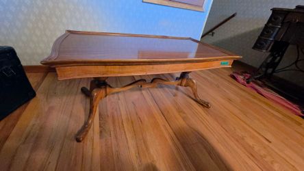 Antique Coffee Table with a lip.
38"w x 20"d x 17"h
This peice is immaculate! Shines like new!