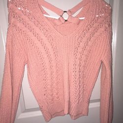 Pink Sweater with some Holey Designs 