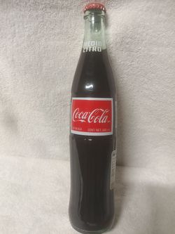 (1) Coca Cola Medio Litro