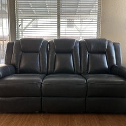 Power Reclining Sofa And Loveseat by Ashley