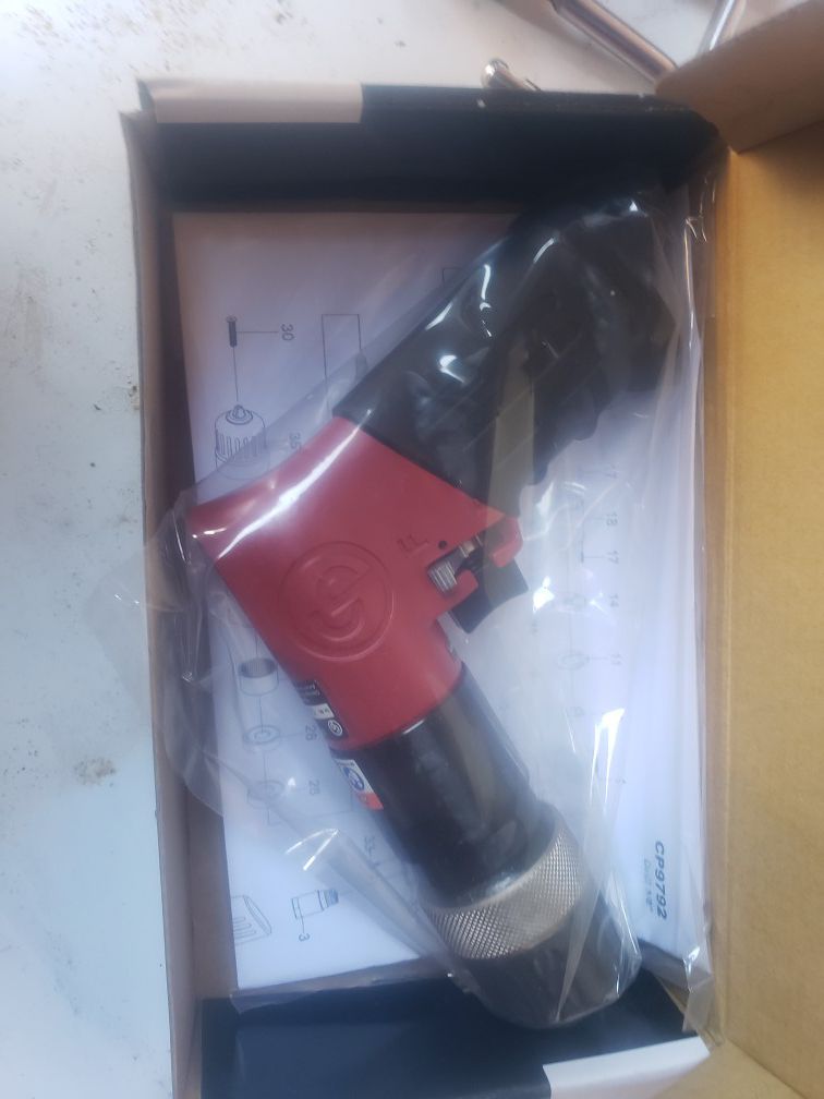 Chicago pneumatic reversible drill