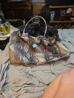 Dsw original tote bag  faux snake skin..opens to about 20" 12"high  20" long