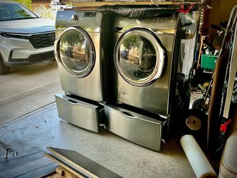 Samsung Front Load Washer And Electric Dryer Set With Pedestals