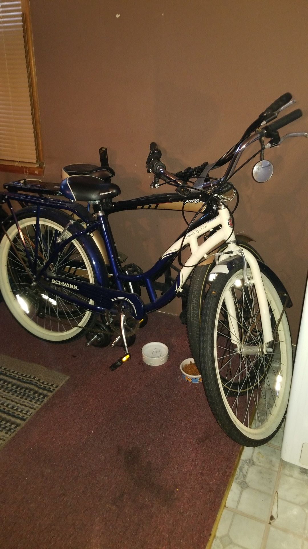 2 bikes. Mens and women's. With tow-hitch bike rack and saddle bag