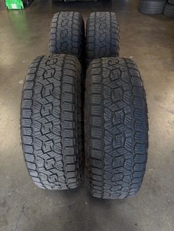 Set of 4 used Toyo Open Country AT 265/70/18 265 70 18