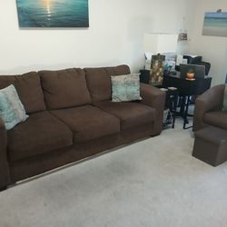 sofa and armchair in brown