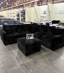 Sectional sofa with ottoman black fur-like jumbo corduroy