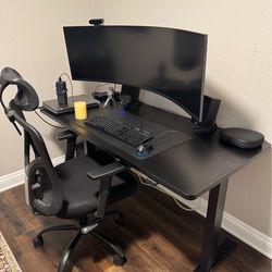 flexispot electric adjustable standing desk , ergonomic chair ,  ultra wide monitor mount