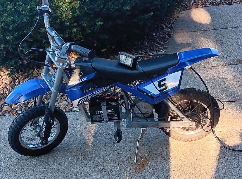 New batteries new charger mx350 dirt bike 24 volts 15 miles an hour.
