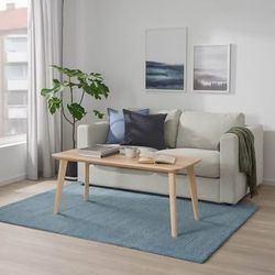 IKEA LANGSTED Light Blue Rug – 4’4” x 6’5”, Durable & Stain-Resistant ($25)