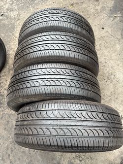 Set of 4 nice tires 235/65/17 ( We install & balance)