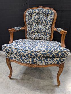 French Provincial Carved Wood Armchair with Cane Back