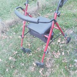WALKER WITH WHEELS & SEAT. 45.00