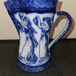 Royal Doulton Morrisian Ware Dancing Ladies Blue & White Jug, identified by the pattern number D1016