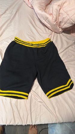 Black and yellow shorts