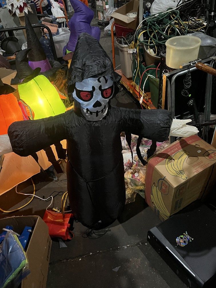Halloween Inflatable:   Huntington Home Grim Reaper, 4 ft. Pre-owned