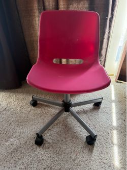 Pink Child’s roller desk chair