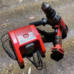 Milwaukee  Hammer drill And Charger 28v