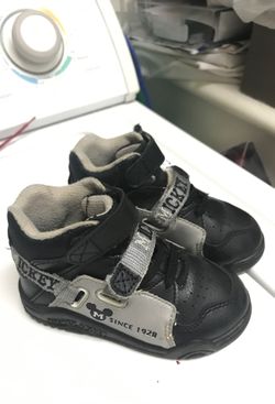 Mickey Mouse buys shoes size 5 - $5
