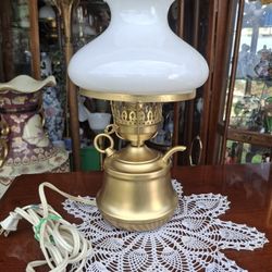  VERY UNIQUE LOOKING VINTAGE  Brass Table Lamp With A white  GLASS GLOBE  GOOD CONDITION WORKS GREAT 