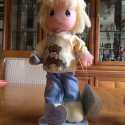 Precious moments collectible doll