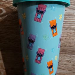 New disney ceramic tumbler of stitch with silicone lid .. 