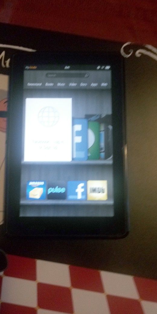 KINDLE 7. WITH. CASE. NEW CONDITION