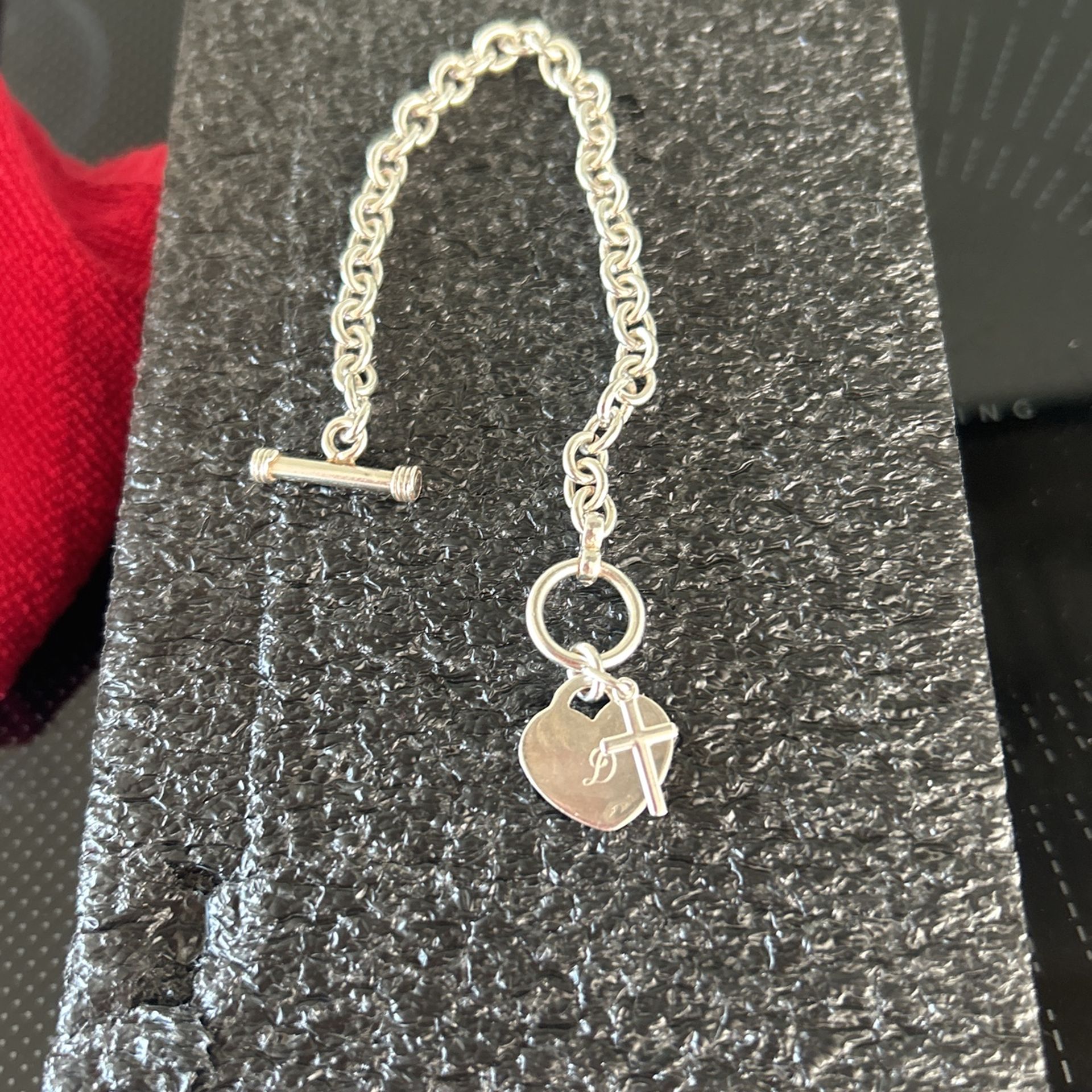 Sterling Silver Heart And Cross Bracelet.