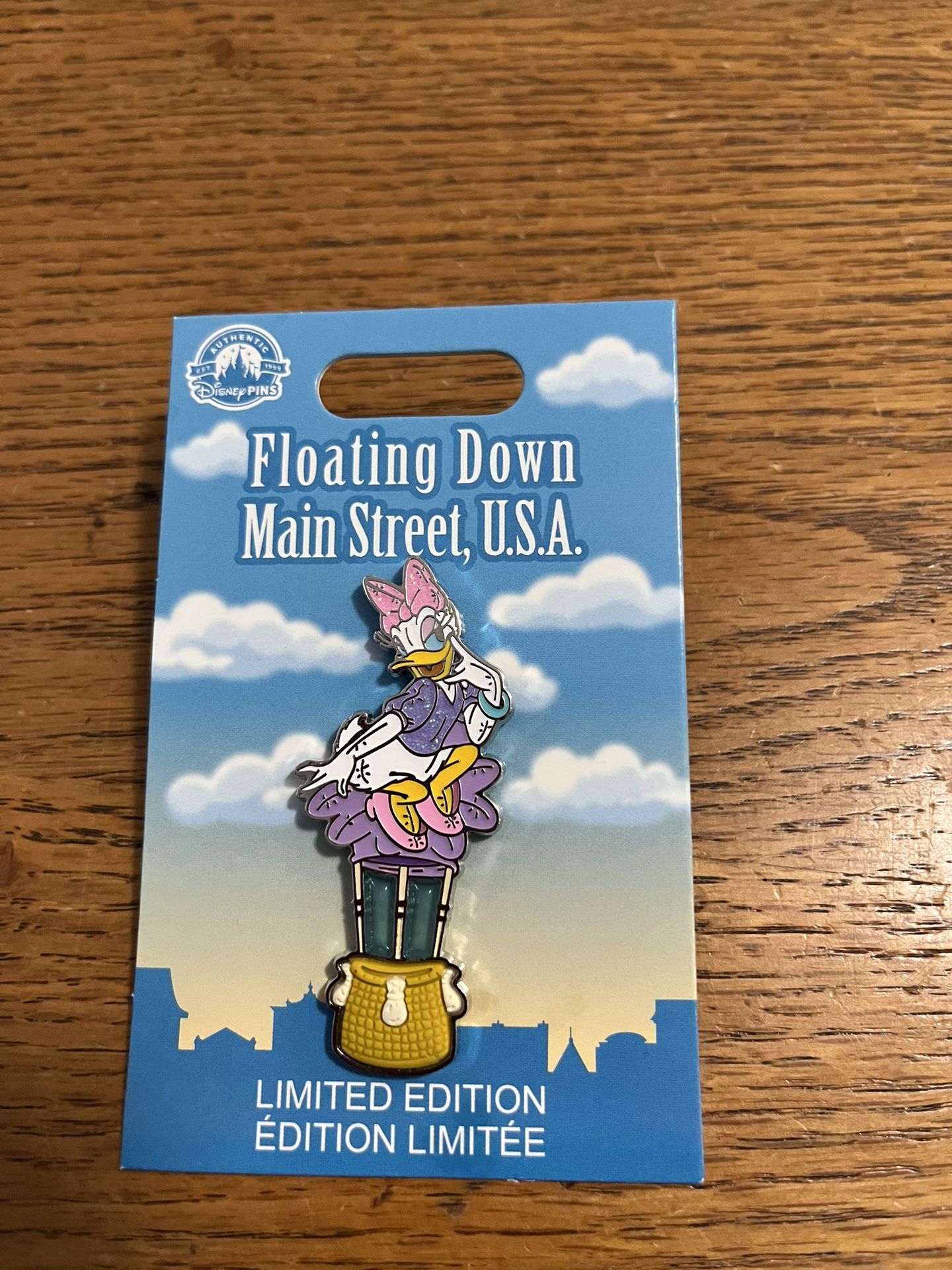 Disney Pin Daisy Duck Floating Down Main Street USA. Brand new on original card. Smoke free home