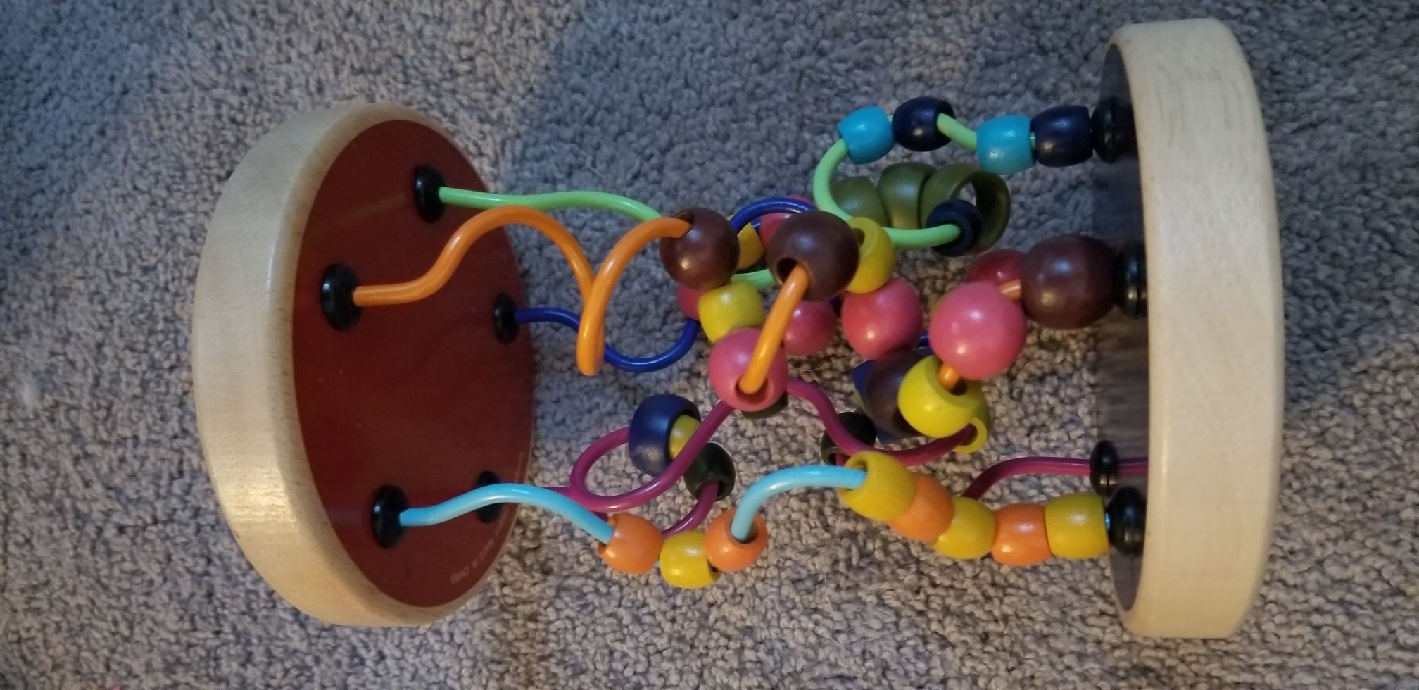 Battat wooden bead rolling toy
