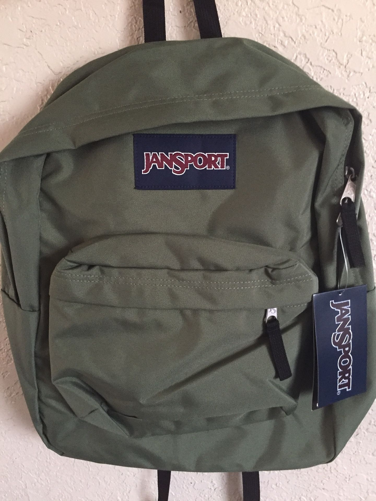 Olive green Jansport authentic backpack with tags