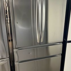 NEW OPEN BOX LG FOUR DOOR REFRIGERATOR 