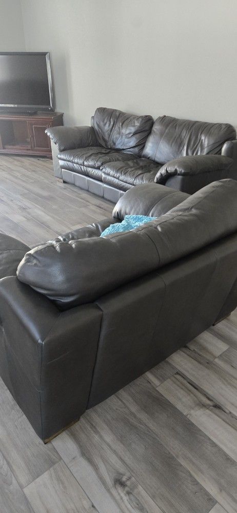 Genuine Leather Couches With 2 Matching Ottomans
