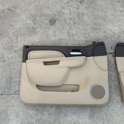 2010-2014 GMC YUKON SIERRA DENALI FRONT DOOR PANELS, LIGHT CASHMERE/VERY DARK CASHMERE COLOR