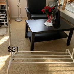 Nice Clothes Rack With A Wooden Hangers Available 