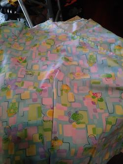 SCRUB SHIRT SIZE. I BELIEVE ITS A SMALL