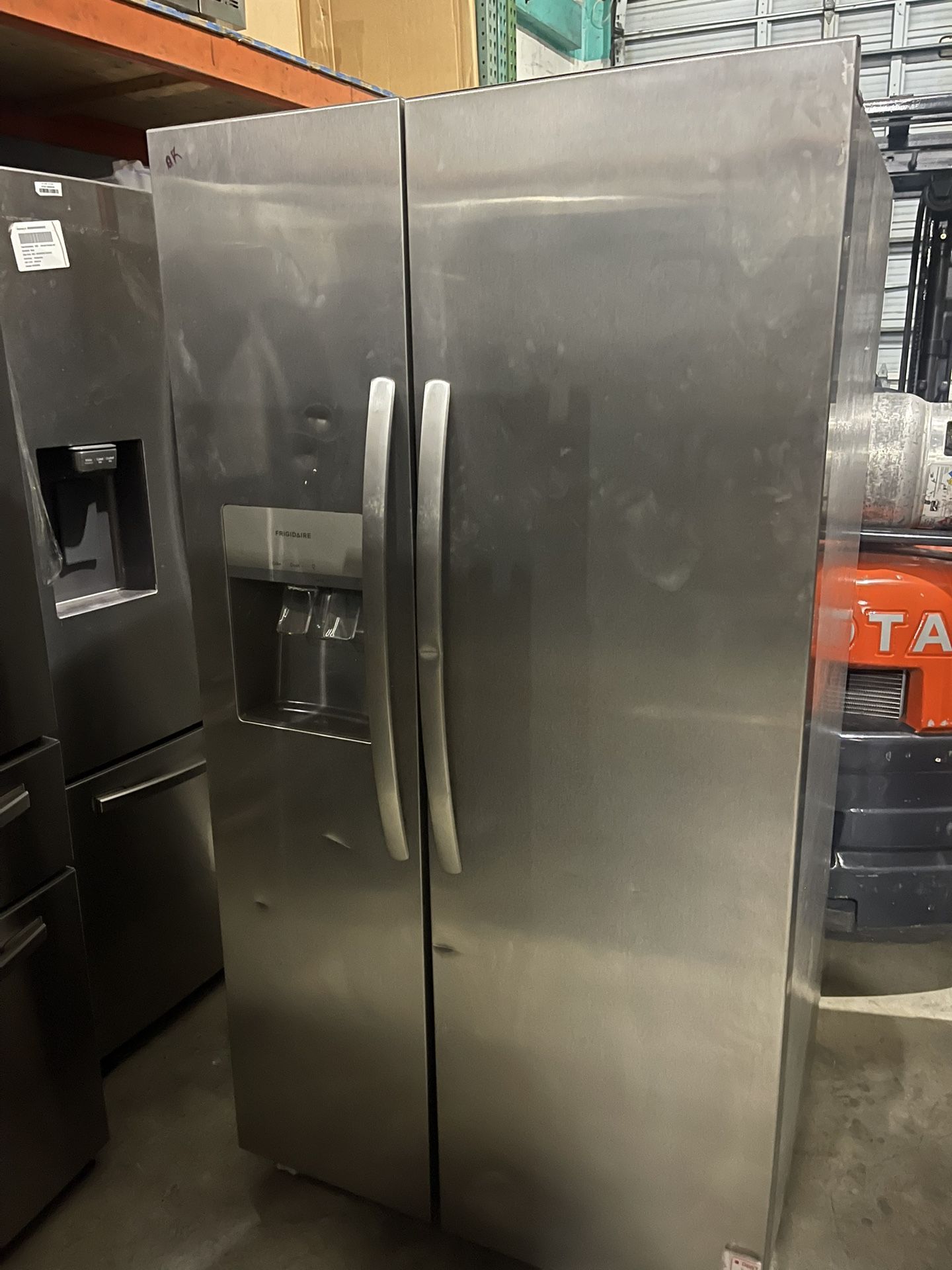 Refrigerator Frigidaire side by side stainless les steel