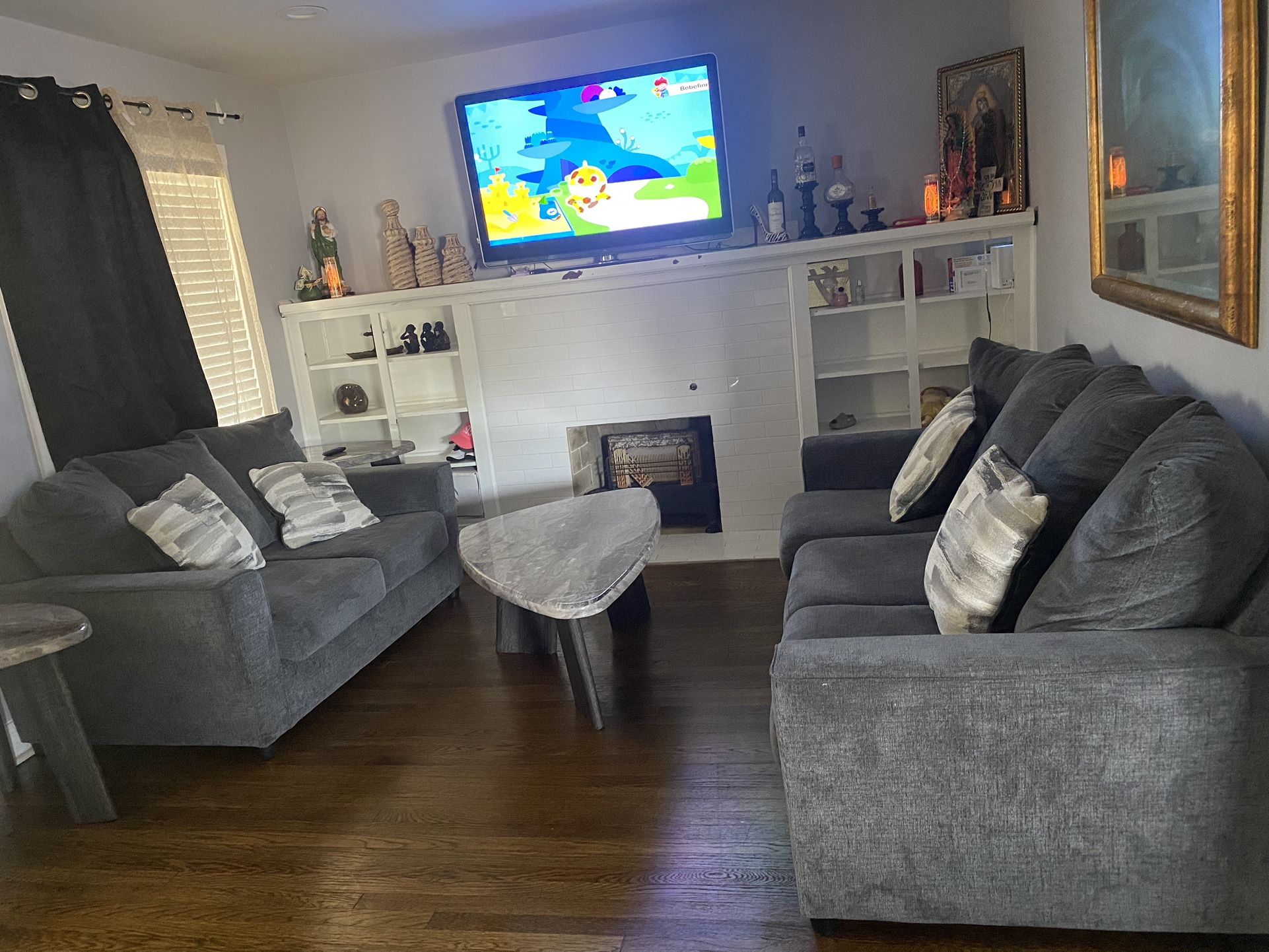 Sofas with 3 small tables $750