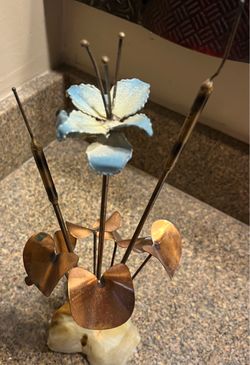 Metal Flower Sculpture on Stone Base