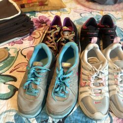 Four Pairs  Of Girls Shoes 