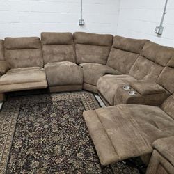 Suede Reclining Sectional
Delivery Options Available!