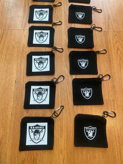 Brand New Raiders logo mini Bag’s with metal clips $10 each