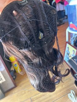 Hijuki brand wavy lace front wig in a dark brown
