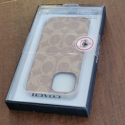 Coach iPhone 14 IPhone Slim Wrap Slim Wrap Signature C Tan. New in 
original package. UPC (contact info removed)37