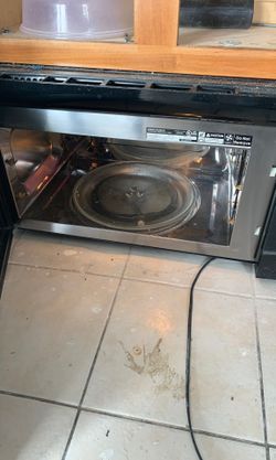 Vented over the range microwave