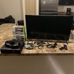 Black Xbox 360 4GB Slim With 31 Games, Two Controllers And A Roku Tv!