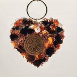 Love Keychain/Pocket Orgonite, Provides EMF Protection, and Empowerment


Dimensions:

Weighs  2.2 oz

High 2.4 in.

Wide 2.4  in.

Thick 0.4


Materi