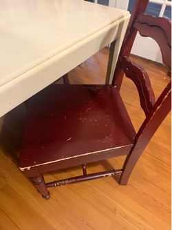 Table and 4 brown chairs