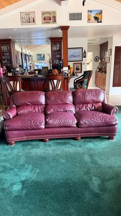 Genuine Leather Burgundy Sofa – Boyles Distinctive Furniture – $600