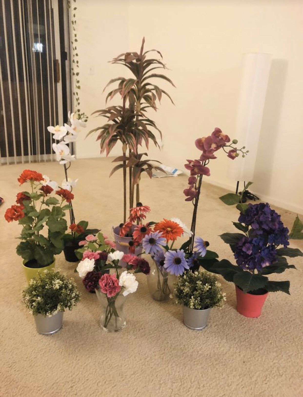 Artificial plants and flowers with pots and vases